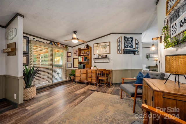 office area with dark wood-type flooring, ceiling fan, lofted ceiling, and ornamental molding