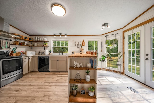 kitchen featuring a textured ceiling, dishwasher, stainless steel electric range, light hardwood / wood-style floors, and crown molding