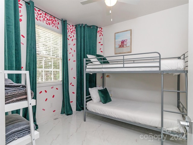 bedroom featuring ceiling fan