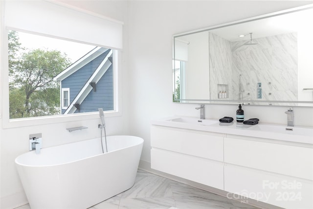 bathroom with independent shower and bath and vanity