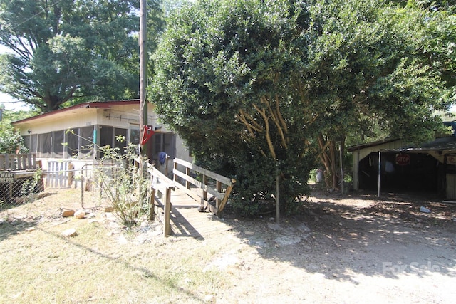 view of yard featuring a carport