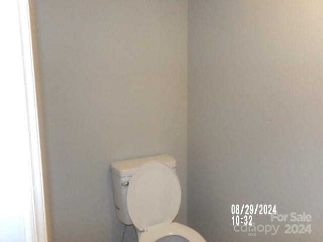 bathroom featuring toilet