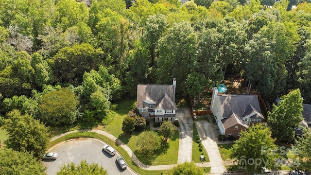 bird's eye view with a forest view