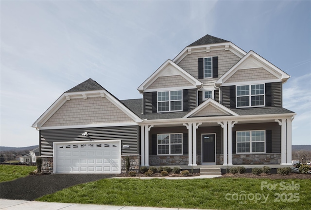 837 Lake Forest Drive Nottingham, Belmont, NC 28012 - view of front of home with stone siding, driveway, a garage, a front yard, and a shingled roof