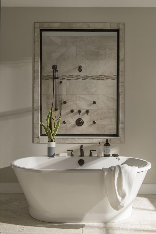 837 Lake Forest Drive Nottingham, Belmont, NC 28012 - bathroom featuring a soaking tub and baseboards