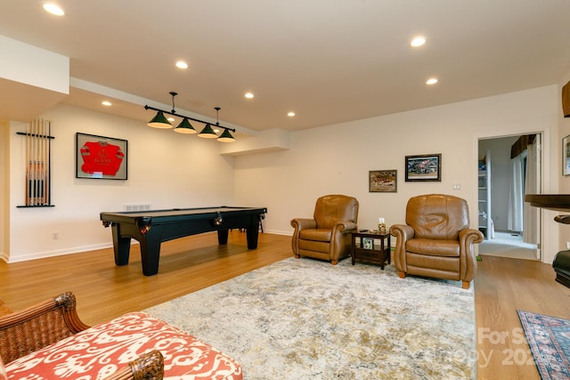 game room featuring light hardwood / wood-style flooring and pool table