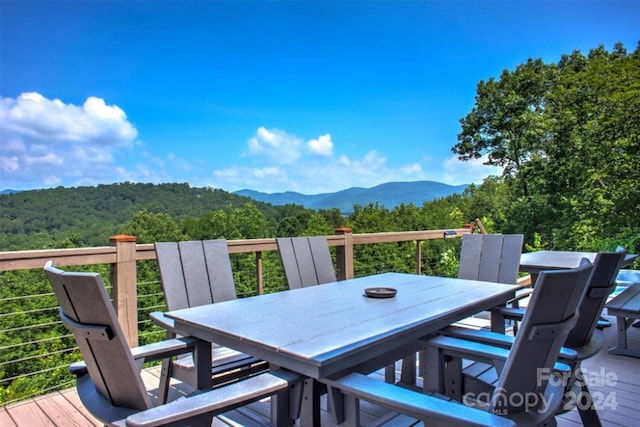 wooden terrace with a mountain view