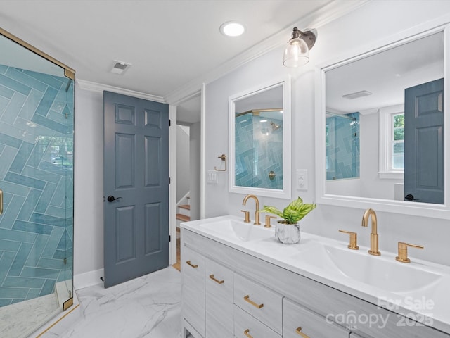 bathroom featuring a shower with door, ornamental molding, and vanity