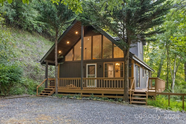 view of front of house featuring a wooden deck