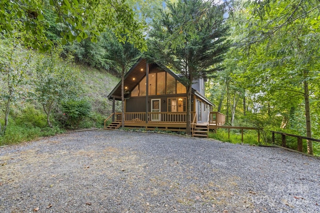 view of front of house with a wooden deck