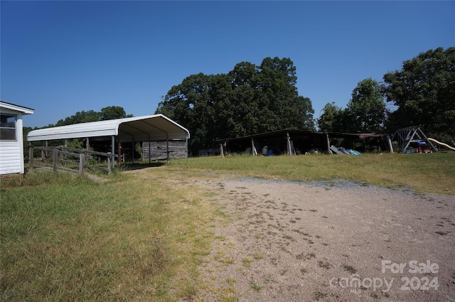 view of yard with a carport