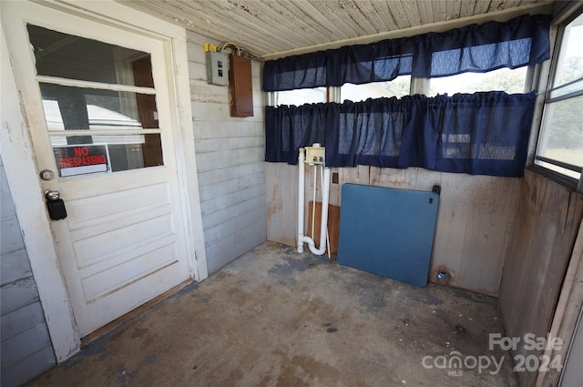 unfurnished sunroom featuring wood ceiling