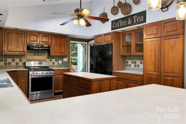 kitchen featuring backsplash, gas stove, black fridge with ice dispenser, extractor fan, and ceiling fan