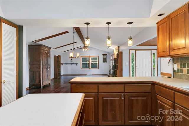 kitchen with dark hardwood / wood-style floors, an inviting chandelier, decorative light fixtures, tasteful backsplash, and vaulted ceiling with beams