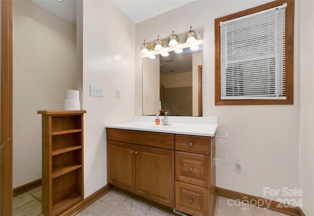 bathroom featuring vanity and tile patterned floors