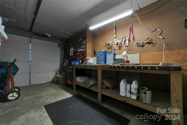 garage with a workshop area