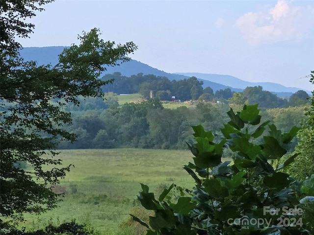 property view of mountains featuring a rural view