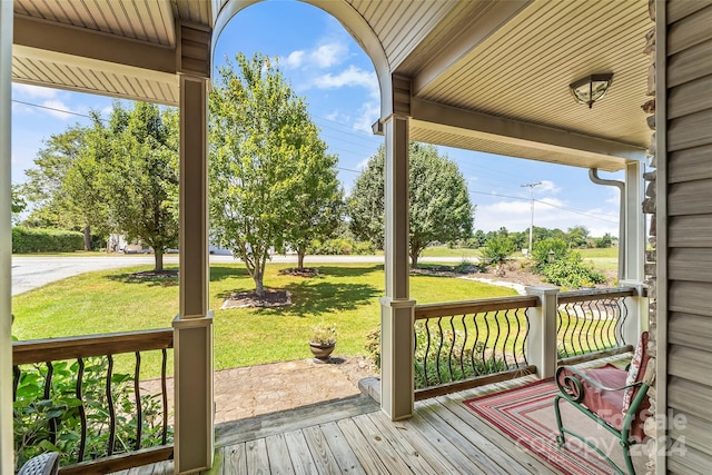 deck featuring a yard