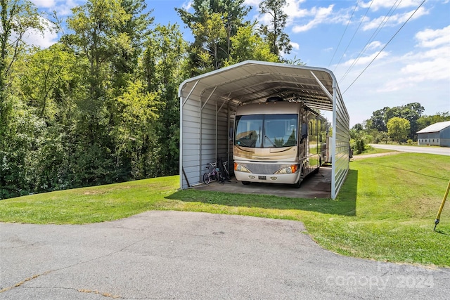 view of car parking with a lawn and a carport