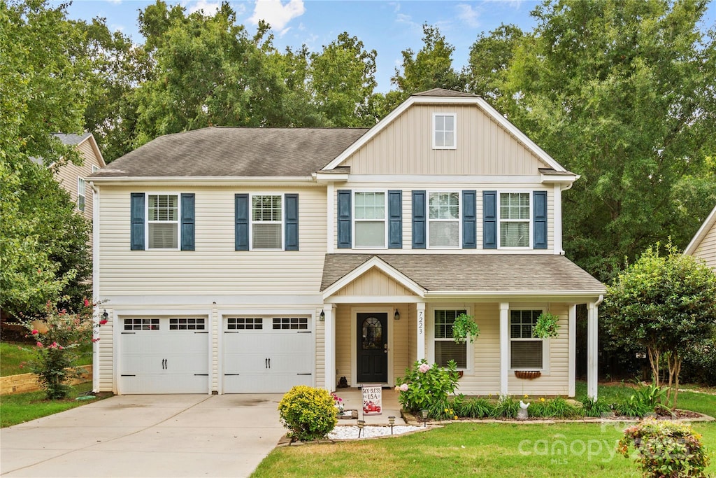 view of front of property with a garage