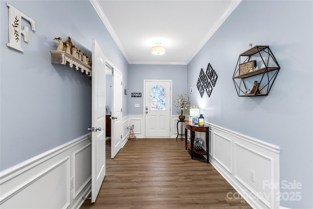 doorway to outside with crown molding and dark wood-type flooring