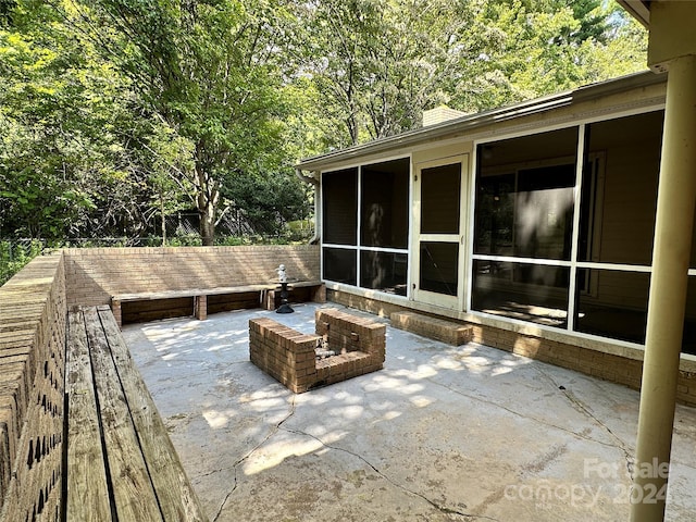 view of patio / terrace with a sunroom