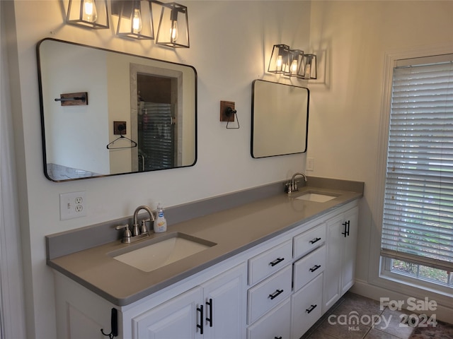 bathroom featuring vanity and tile patterned floors