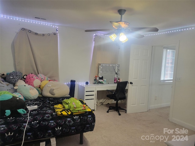 carpeted bedroom featuring ceiling fan