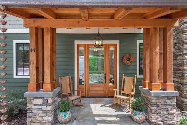 property entrance featuring covered porch