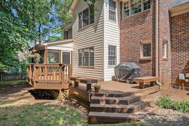 wooden terrace with grilling area