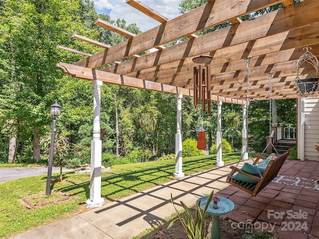 view of patio featuring a pergola