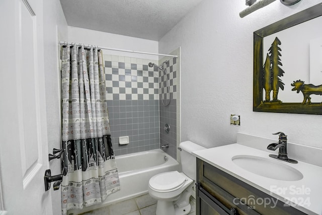 full bathroom with a textured ceiling, vanity, shower / tub combo, tile patterned flooring, and toilet