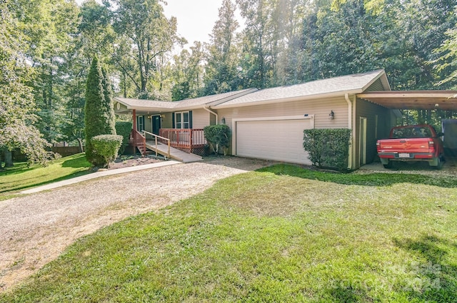 ranch-style house with a front lawn, a carport, and a garage