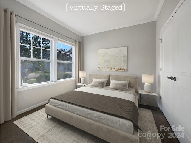 bedroom with dark carpet, ornamental molding, and multiple windows