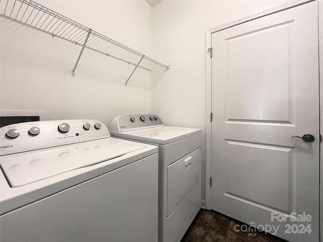 clothes washing area featuring washing machine and dryer