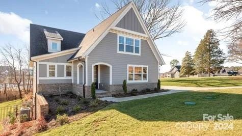 view of front of house with a front lawn