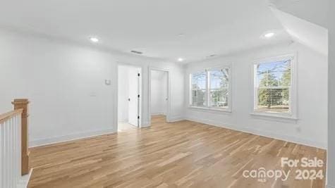 bonus room featuring hardwood / wood-style flooring