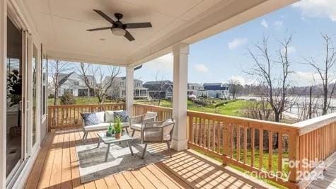 wooden deck with ceiling fan