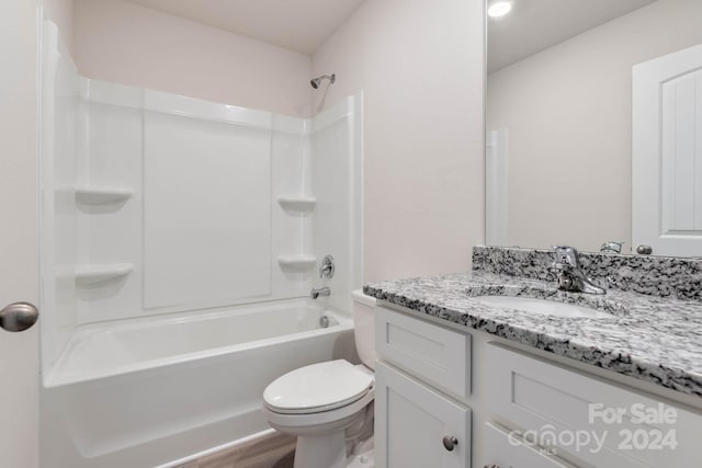 full bathroom featuring vanity, toilet, wood-type flooring, and shower / tub combination