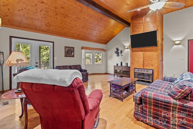 bedroom with light wood-type flooring, ceiling fan, lofted ceiling with beams, and access to outside