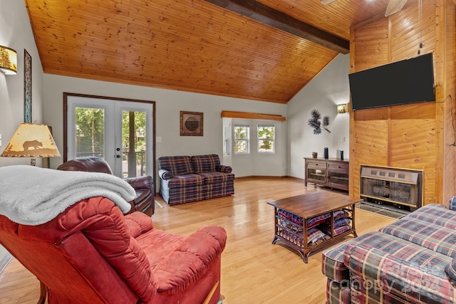 living room with wood ceiling, plenty of natural light, light hardwood / wood-style flooring, and lofted ceiling with beams