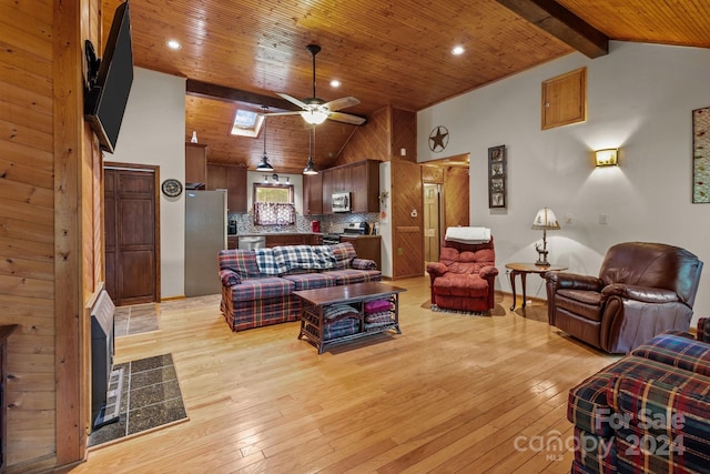 living area with high vaulted ceiling, wood ceiling, a ceiling fan, beamed ceiling, and light wood-style floors