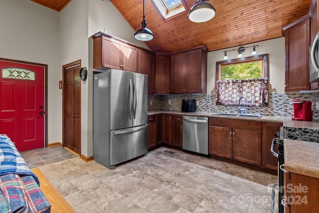 kitchen with wooden ceiling, tasteful backsplash, stainless steel appliances, sink, and a skylight