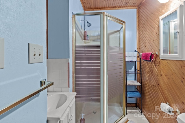 bathroom featuring vanity, wood ceiling, wood walls, and a shower stall