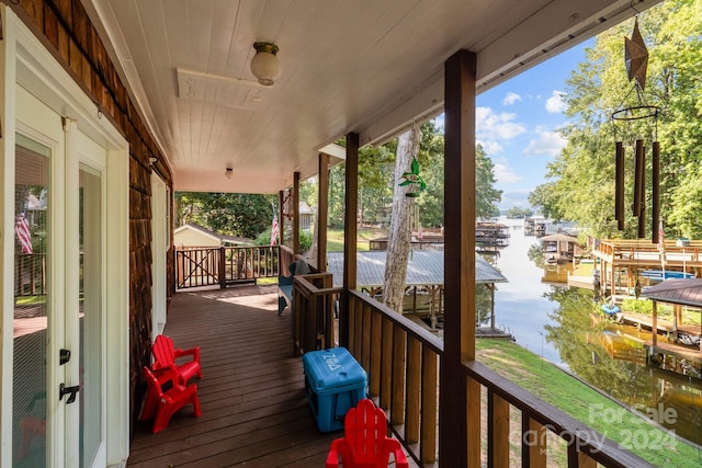 deck featuring a water view