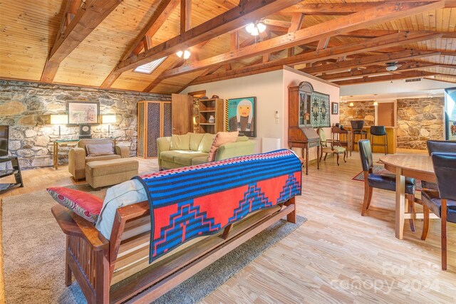 interior space featuring wooden ceiling, hardwood / wood-style flooring, and lofted ceiling with beams