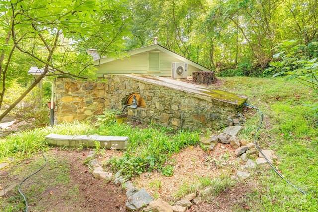 view of yard featuring ac unit