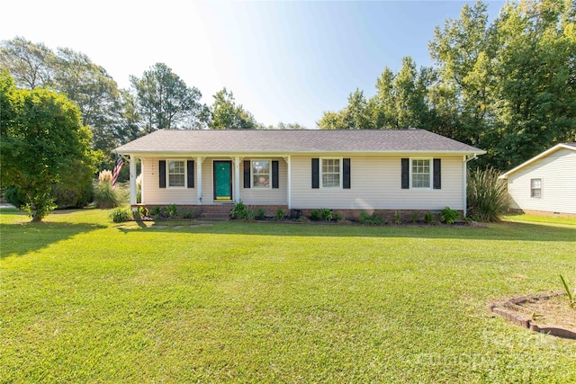 ranch-style house featuring a front lawn