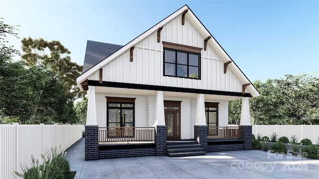 modern farmhouse style home with covered porch