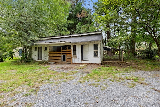 view of front facade with an outbuilding